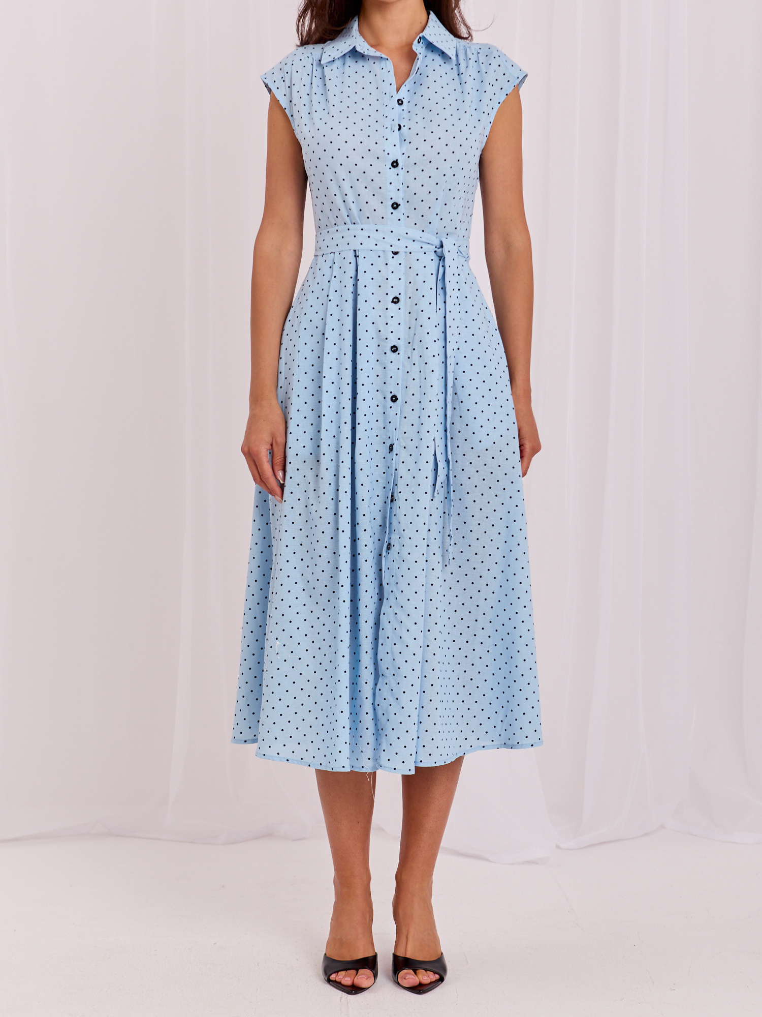Light blue shirt dress with polka dots.