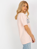 Hurt Jasnobrzoskwiniowy damski luźny t-shirt z nadrukiem 