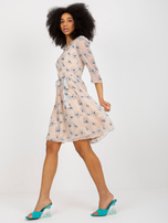 Hurt Beżowa rozkloszowana sukienka z printem i paskiem