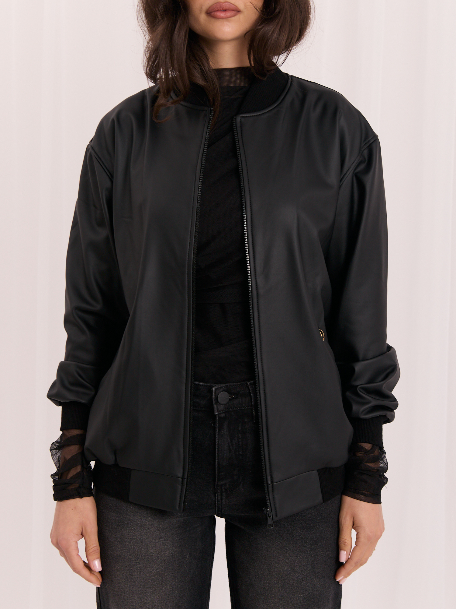 Black leather jacket with velvet lining.