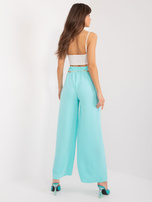 Hurtownia Miętowe materiałowe spodnie na lato