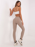 Hurt Ciemnobeżowe legginsy sportowe push-up