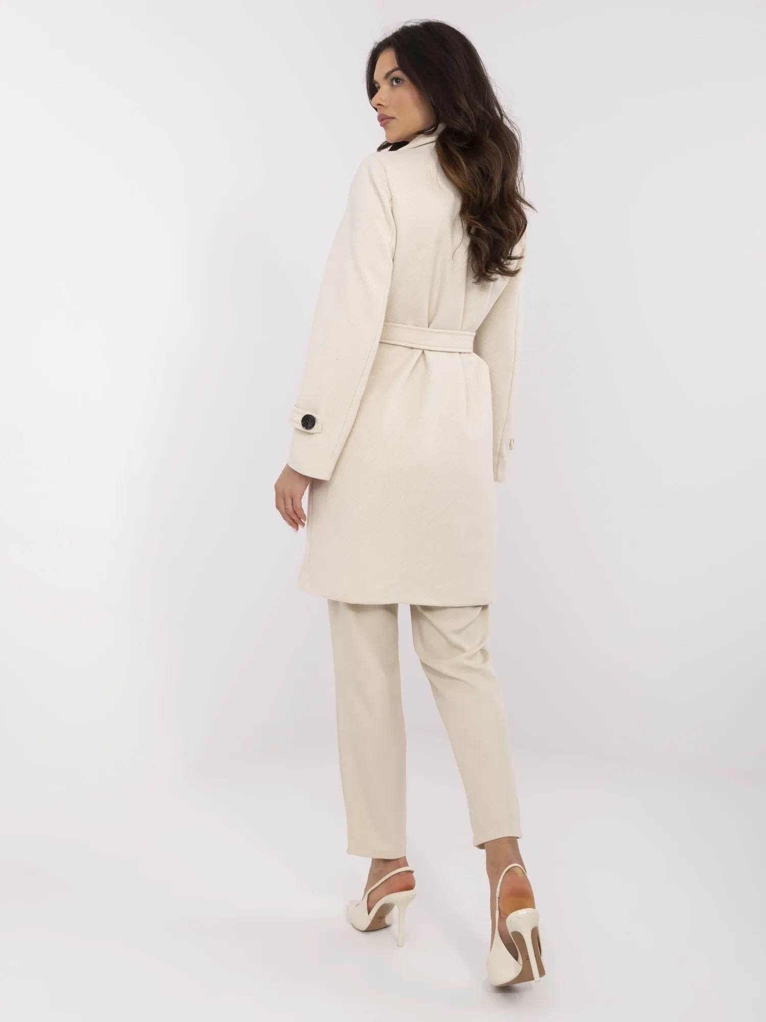 Light beige women's knee-length coat.