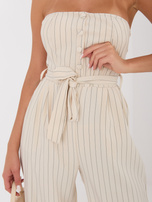 Beżowy elegancki kombinezon z szerokimi nogawkami