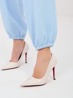 Pastelowe niebieskie dresowe spodnie ze ściągaczami