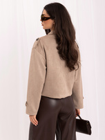 Beige zweireihige Jacke aus Wildlederimitat.