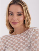 White transparent lace blouse.