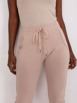 Hurt Beżowe damskie spodnie dresowe z lampasami