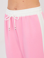 Różowe dresowe spodnie z miękkiego materiału RUE PARIS 