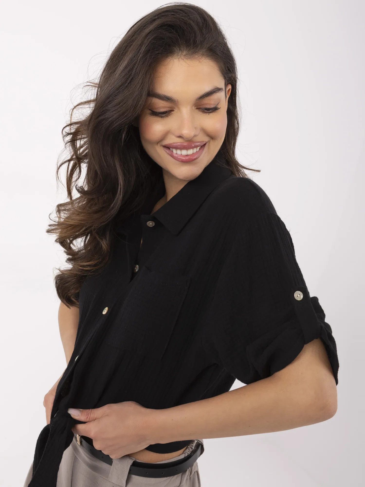 Black muslin shirt with a tie.