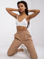 Beżowe spodnie damskie z ekoskóry Porto