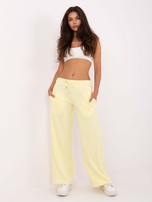 Jasnożółte dresowe spodnie z kieszeniami