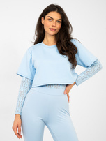 Pastelowe niebieskie body z zapięciem na haftki