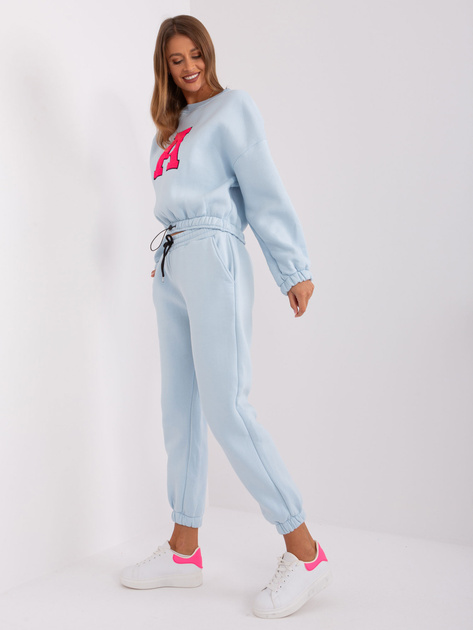 Hurtownia Jasnoniebiesko-fluo różowy komplet dresowy z bluzą