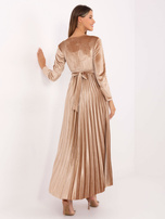 Beige evening dress with sequins.
