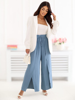 Dark blue wide-leg pants with slits.