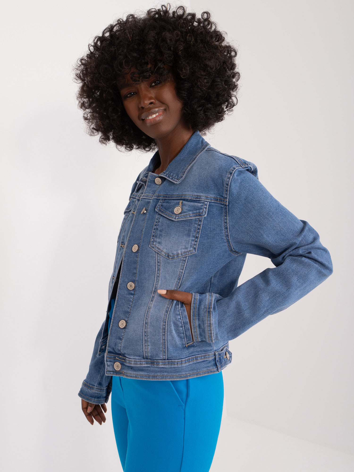 Wholesale Blue denim jacket with buttons.