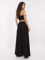 Black summer palazzo pants with a thin belt.