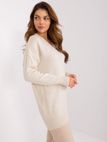 Hurtownia Jasnobeżowy damski sweter z dzianiny