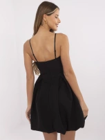 Black cocktail dress with pleats.
