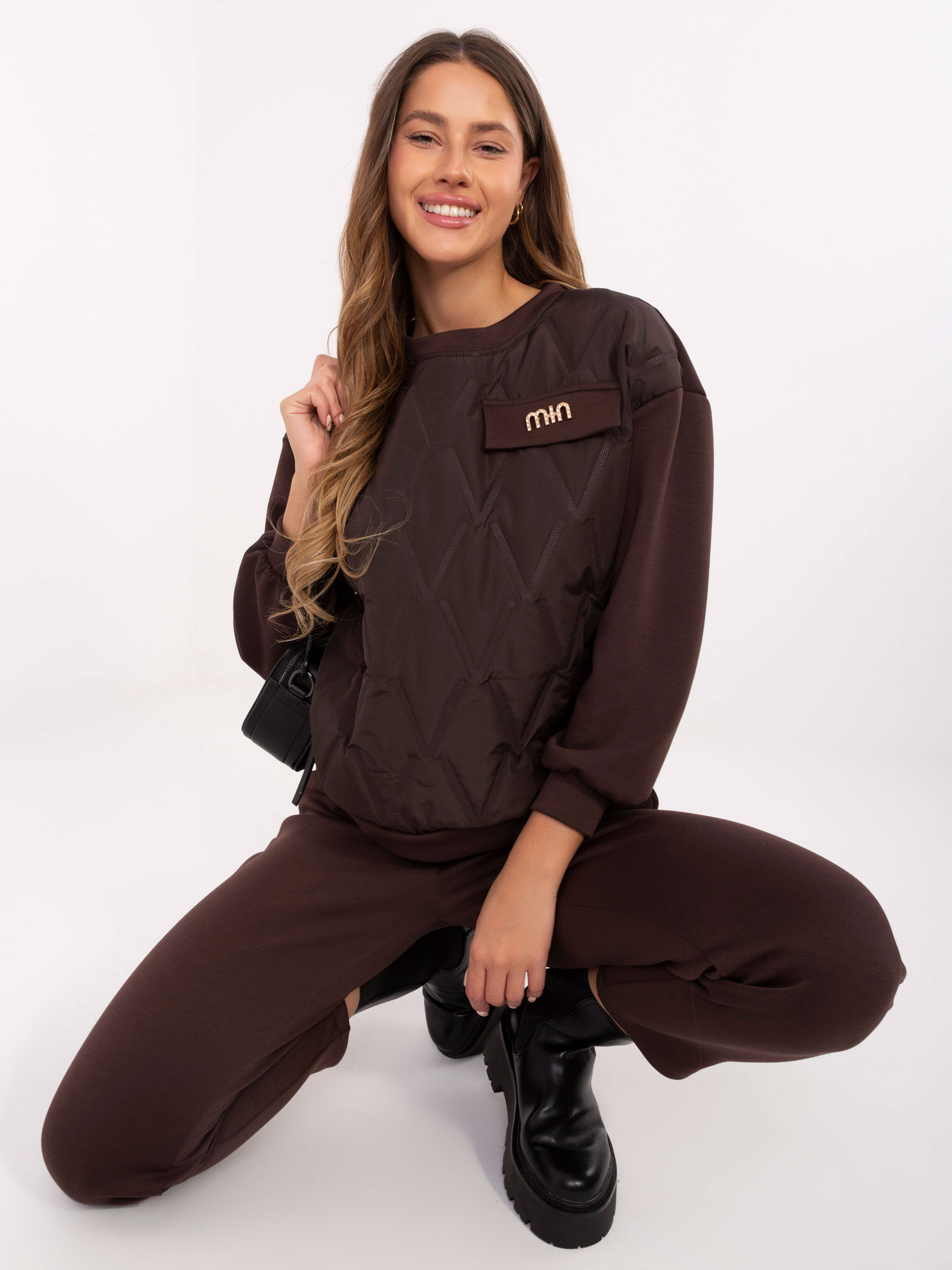 Dark brown quilted two-piece set.