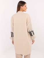 Helle beige Boucle-Cardigan mit puffärmel.
