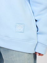Pastelowa niebieska bluza oversize z naszywką RUE PARIS