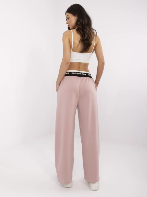 Brudnoróżowe dresowe spodnie z ozdobną gumą