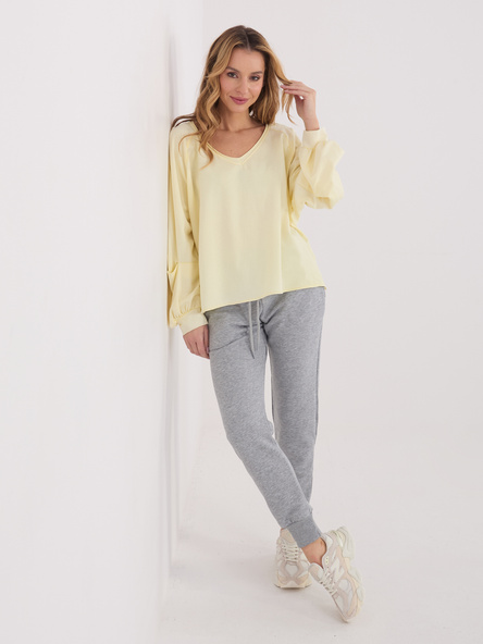 Jasnożółta bluzka oversize z bufiastym rękawem