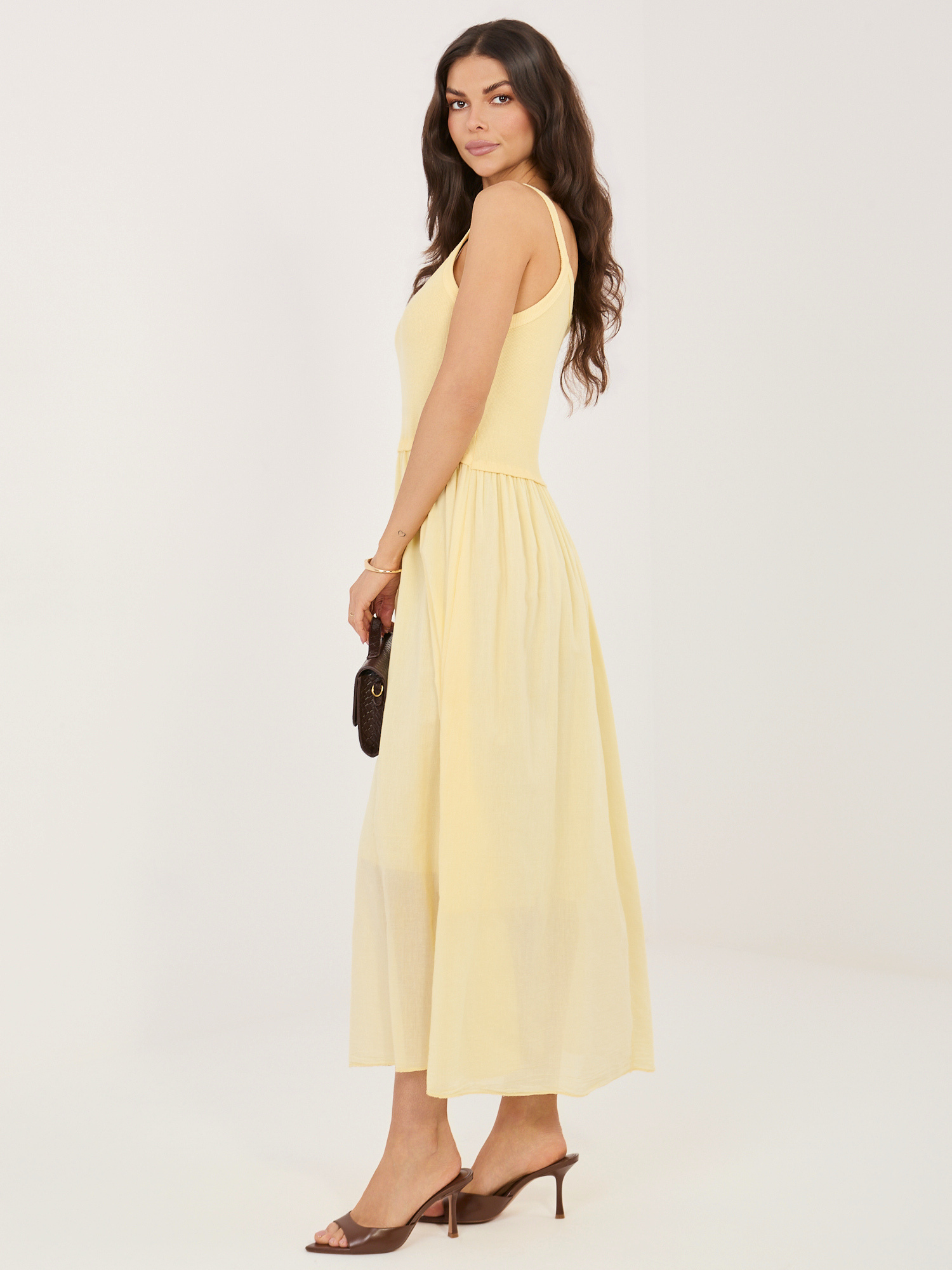 Light yellow flared cotton dress.