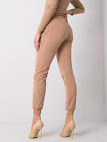 Camelowe spodnie Faster