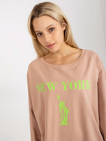 Beige-grüne Damen lange Baumwollbluse mit Druck.