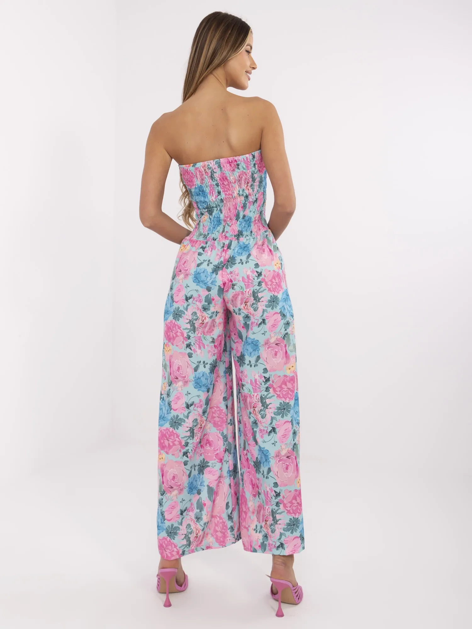Mint-pink women's jumpsuit with flowers.