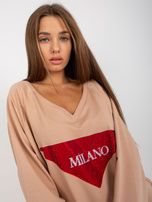 Hurt Beżowa długa bluza oversize z aplikacją z dżetów