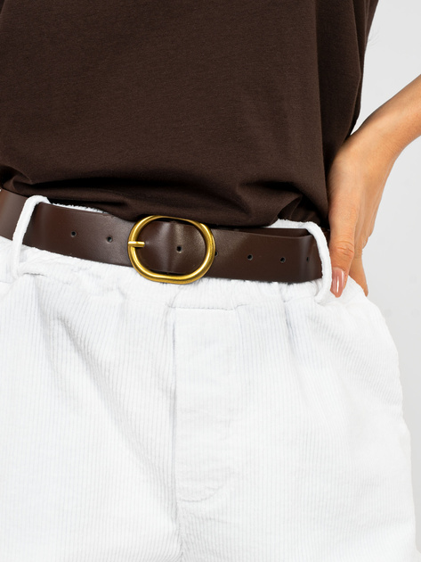 Białe sztruksowe spodnie z kieszeniami