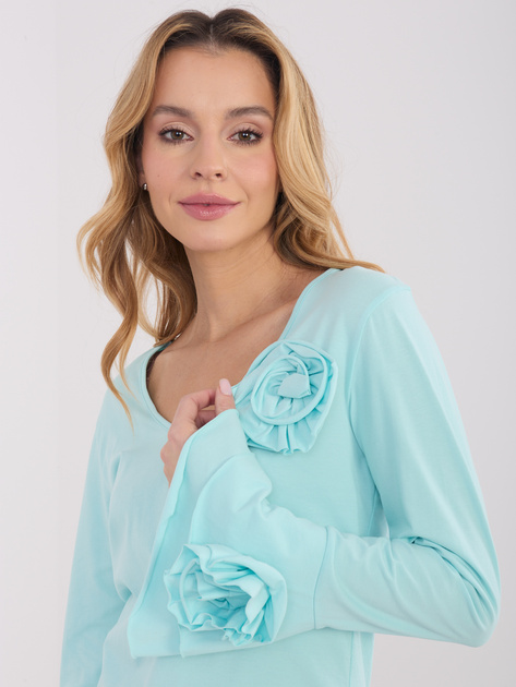 Miętowa bluzka z falbankami przy rękawach