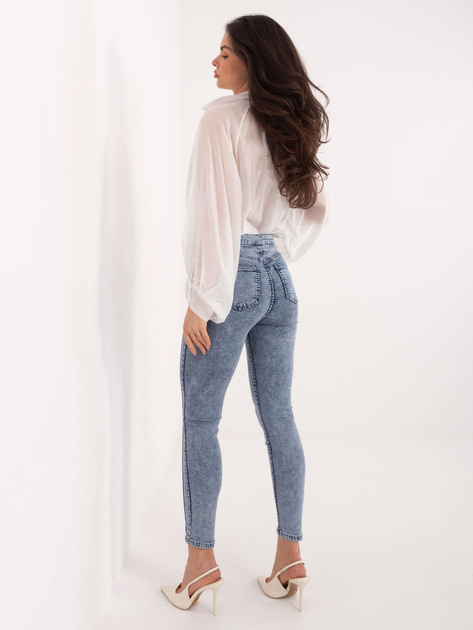 Hurt Niebieskie dopasowane jeansy z ozdobnymi guzikami