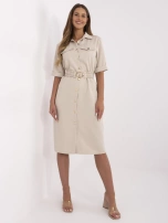 Beige shirt dress with a belt.