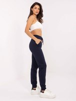 Granatowe dresowe spodnie ze ściągaczami 