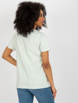 Hurtownia Jasnomiętowy t-shirt z aplikacją i wycięciem