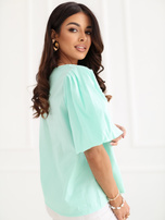 Miętowa bawełniana bluzka z bufiastym rękawem