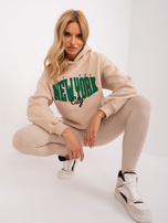 Hurtownia Beżowa luźna bluza dresowa z napisem
