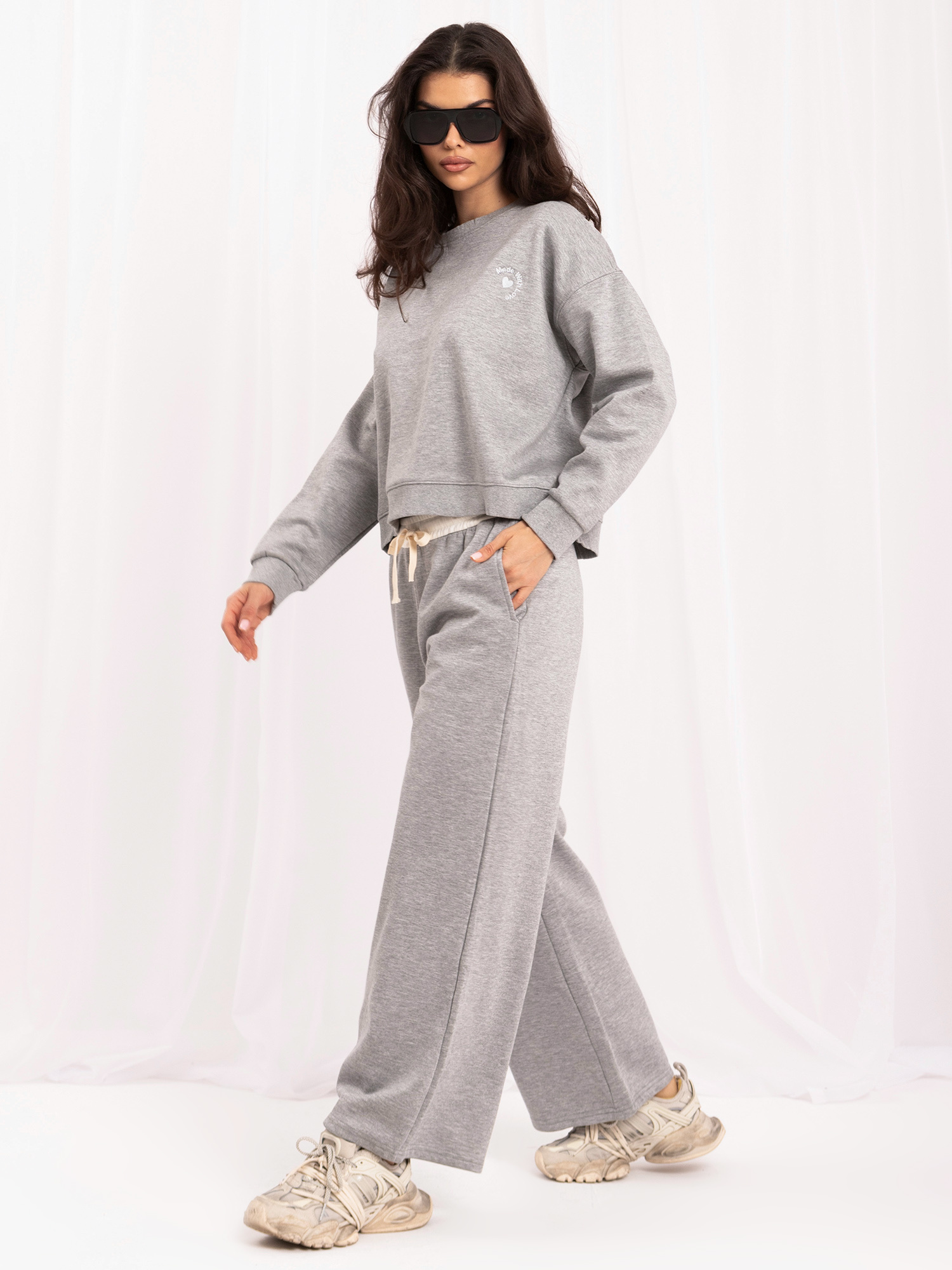 Gray tracksuit set with a contrasting stripe.