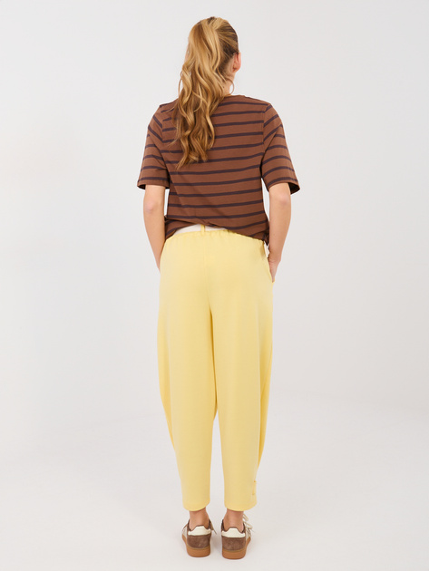 Jasnożółte dresowe spodnie z nogawką 7/8