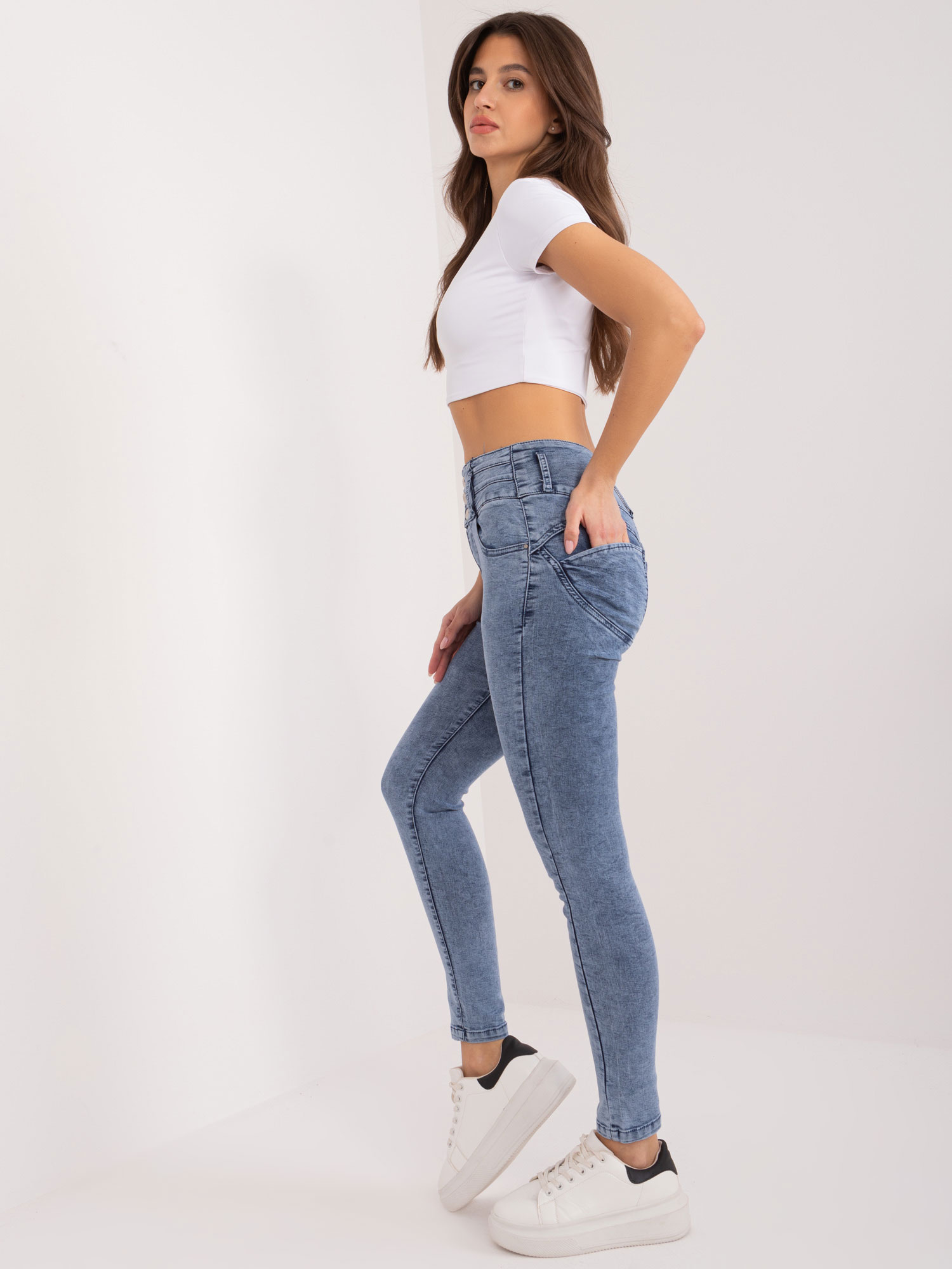 Hurt Blue high-waisted jeans.