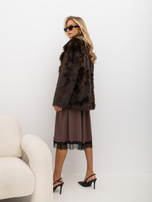 Brown fur jacket with a lapel collar.