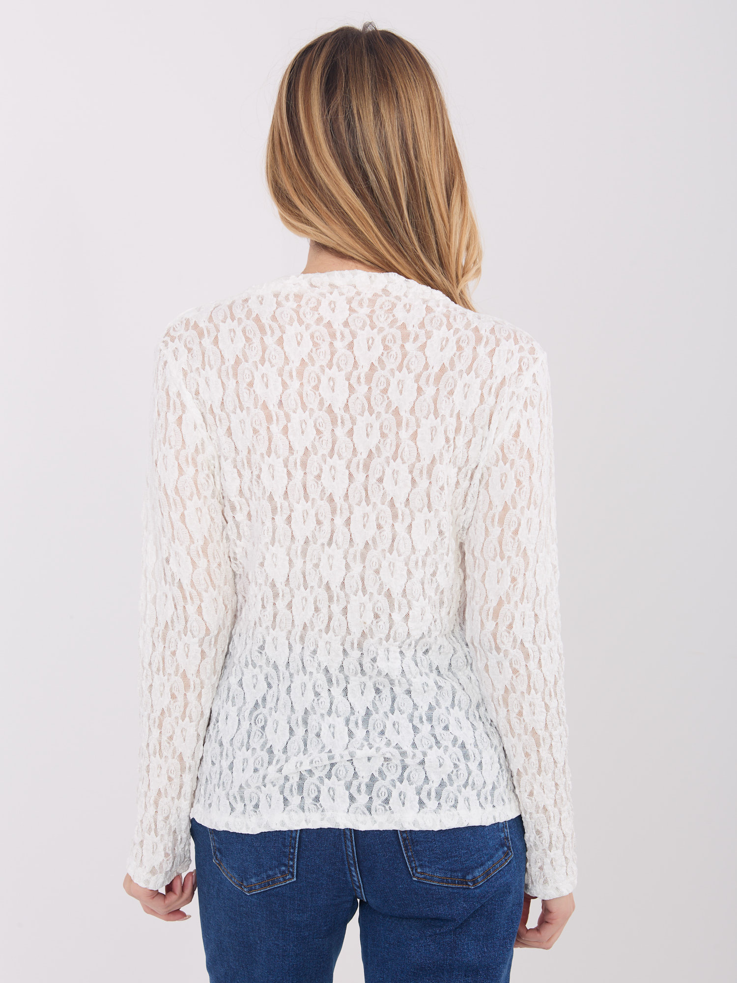 White transparent lace blouse.