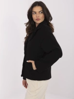 Black short coat with double-breasted fastening.