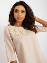 Hurt Beżowa błyszcząca bluzka wizytowa z krótkim rękawem