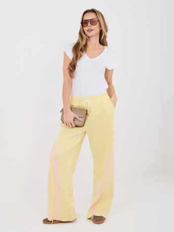 Pastelowe żółte dresowe spodnie z kieszeniami RUE PARIS